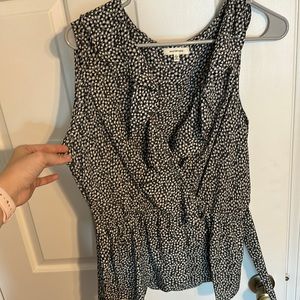 Sleeveless blouse with ruffle detail